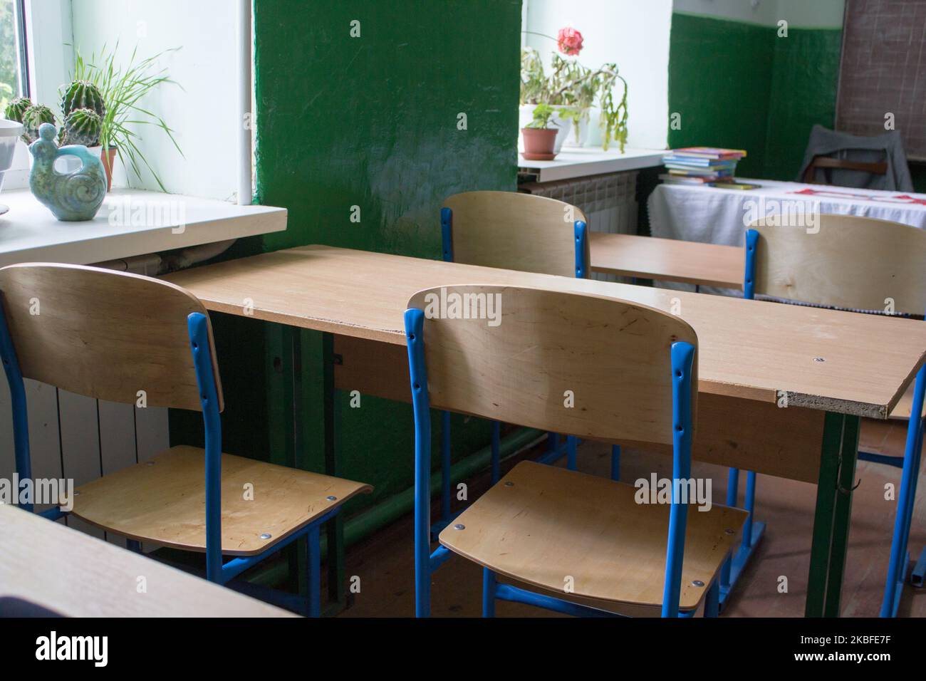 empty classroom with wooden desks without pupils Stock Photo Alamy