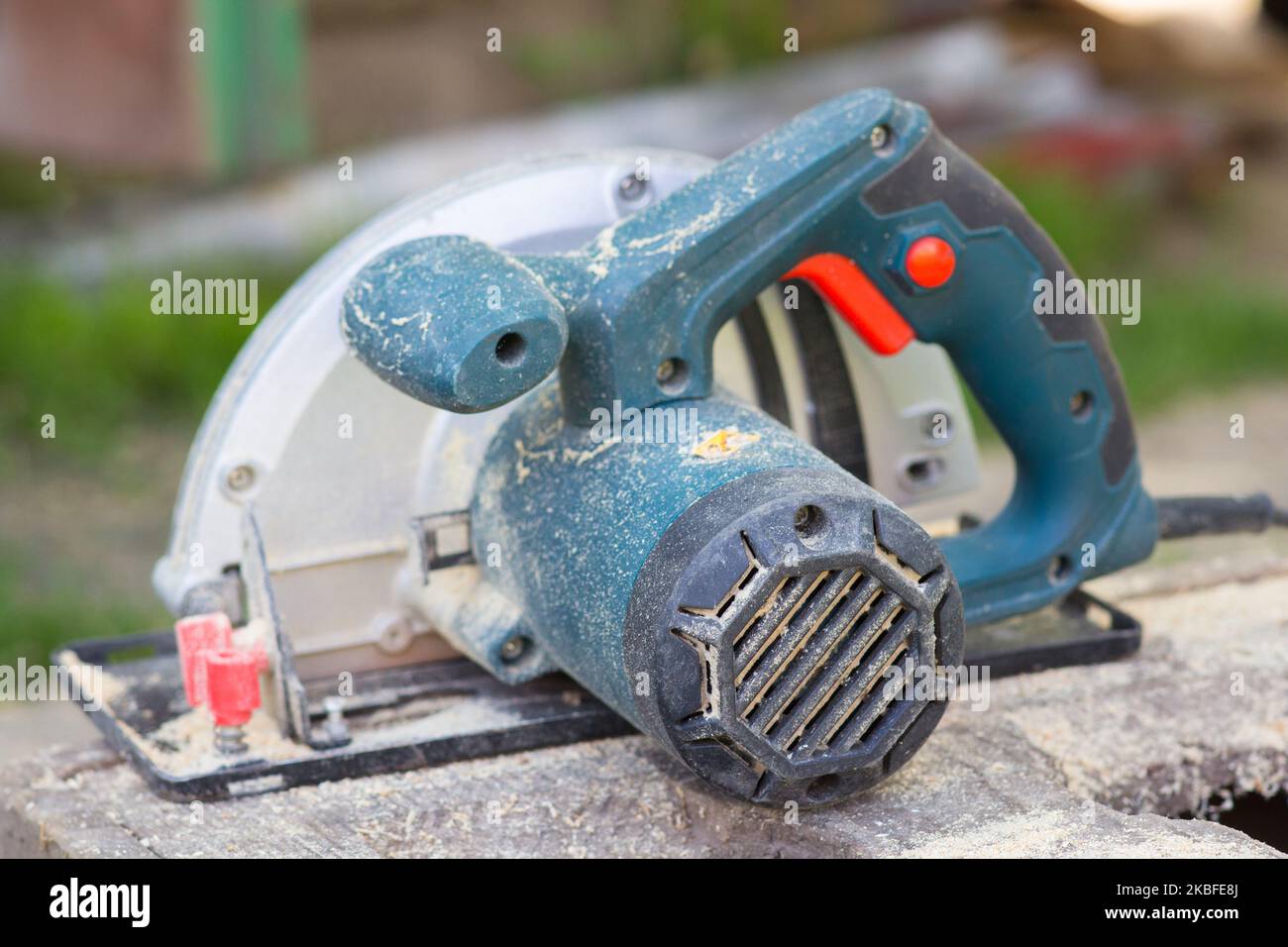 circular saw with wood shavings after work Stock Photo Alamy
