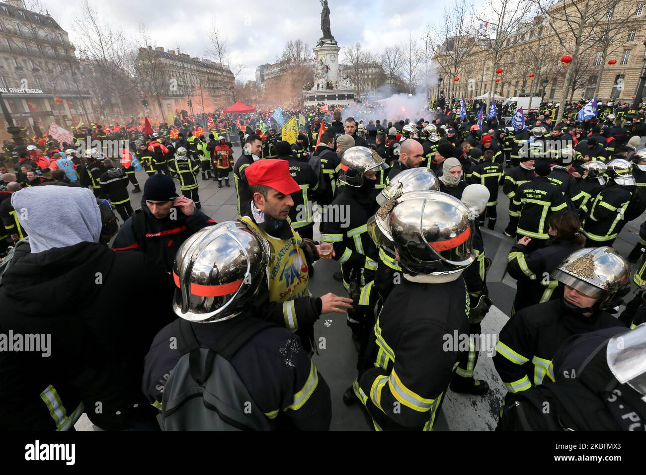 Firefighters gather at Republic Square as they take part in a demonstration to protest against French government's plan to overhaul the country's retirement system in Paris, on January 28, 2020. (Photo by Michel Stoupak/NurPhoto) Stock Photo