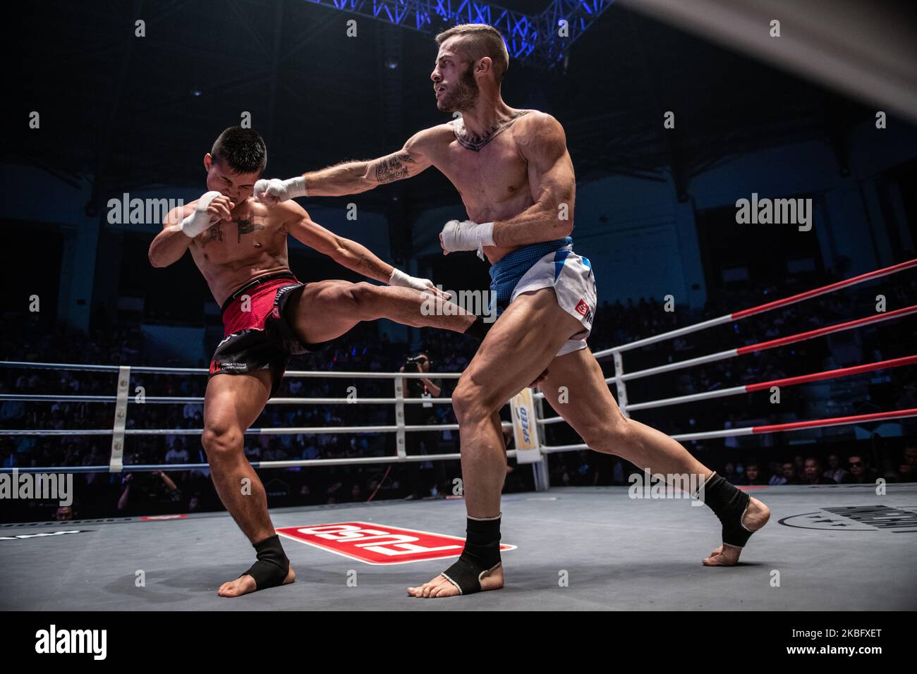 Saw Kaung Htet of Myanmar (R) fights against Samuel Toscano of Italy (L) in their welterweight bout during World Lethwei Championship in Yangon, Myanmar on January 31, 2020. (Photo by Shwe Paw Mya Tin/NurPhoto) Stock Photo
