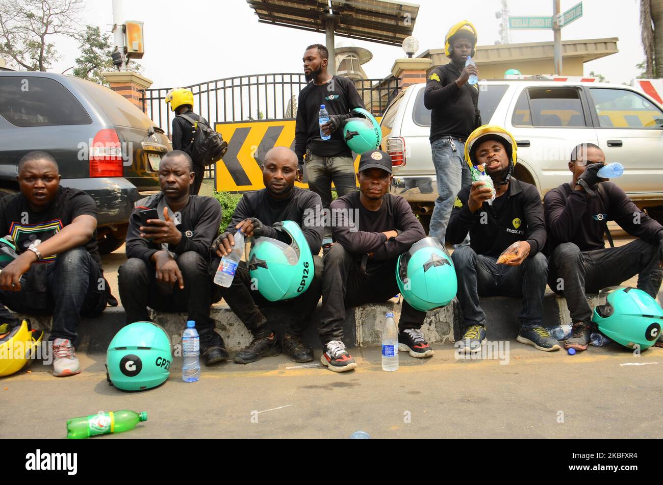 Some of the riders seat to rest during their protest at the Lagos State House of Assembly as Riders on the platform of Opay and Gokada hailing services staged a peaceful protest on Friday, to protest the ban announced by the Lagos State Government on motorcycle and tricycle taking effect from February 1st, on January 31, 2020. (Photo by Olukayode Jaiyeola/NurPhoto) Stock Photo