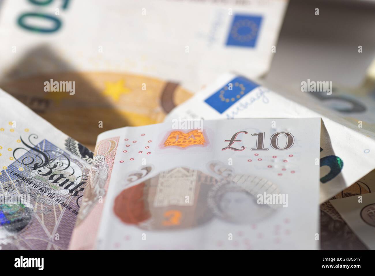 Currency, exchange rate, illustration photo mix of money, Sterling / British Pound GBP and Euro EUR banknotes paper bills and coin at close up pictures after the Brexit. Amsterdam, Netherlands - 02 02 2020 (Photo by Nicolas Economou/NurPhoto) Stock Photo