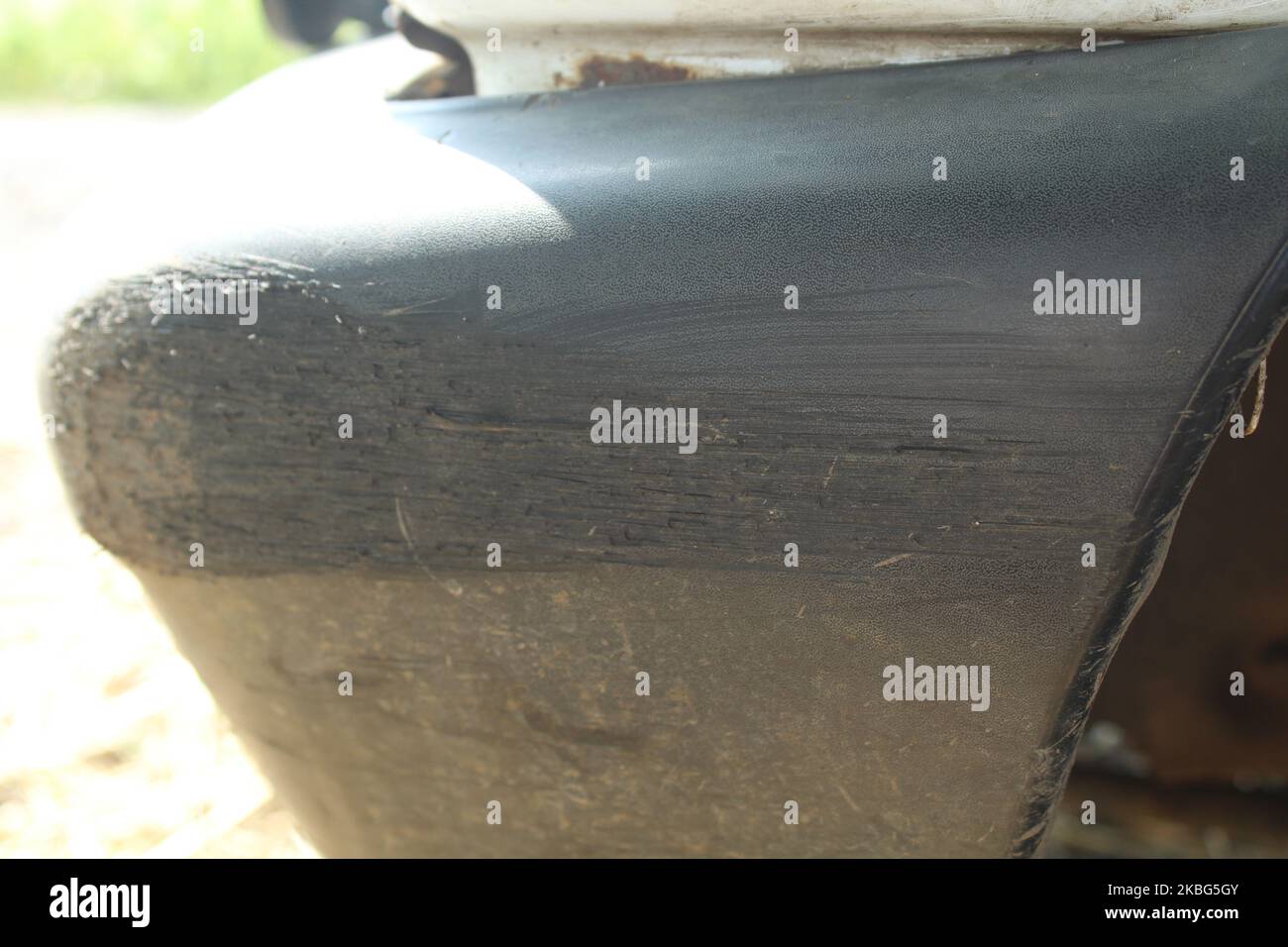 scratch on bumper of car, Bumper car scratched with deep damage to the paint. Dent car scratch
