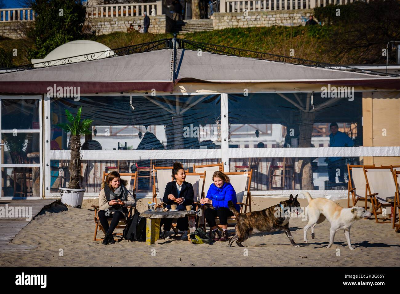 Bulgaria Winter High Temperature Record Broken Bulgarians enjoy themselves on a sunny winter day at the Varna beach, some 450 km to the East of the Bulgarian capital Sofia, on Feb. 3, 2020. Temperatures of the are expected to soar at 20 degrees in Celsius (68 in Fahrenheit). A more then 50 years' high temperature record was broken on Feb 2, as the temperature reached 19 degrees in Celsius (some 66 in Fahrenheit). The weather is supposed to be unusually warm for the next 3-4 days. (Photo by Petko Momchilov/Impact Press GroupNurPhoto) Stock Photo