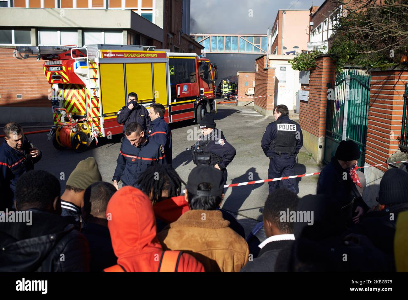 Firefighters and policemen during the operations to extinguish the blaze. A blaze happened in one of the wings of the biggest squat in Toulouse: the 'Squat Russel'. More than 500 people lived there before the blaze. They left nearly all their belongings in the building. There were no casualties People from the squat came from West Africa, Albania, Bulgaria, etc. However, some french students live in this squat. The SAMU (Emergency medical service) and 94 firemen intervened on this fire. The majority of squatters were evacuated to gymnasiums. Toulouse. France. February 4th 2019. (Photo by Alain Stock Photo