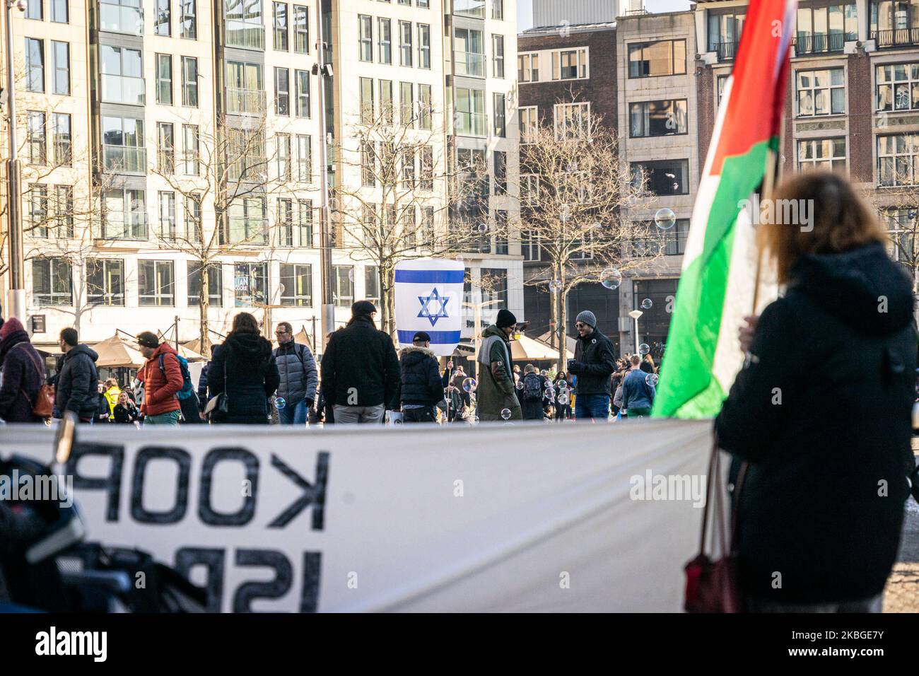 From behind the Pro Palestine supporters with Pro Israel supporters