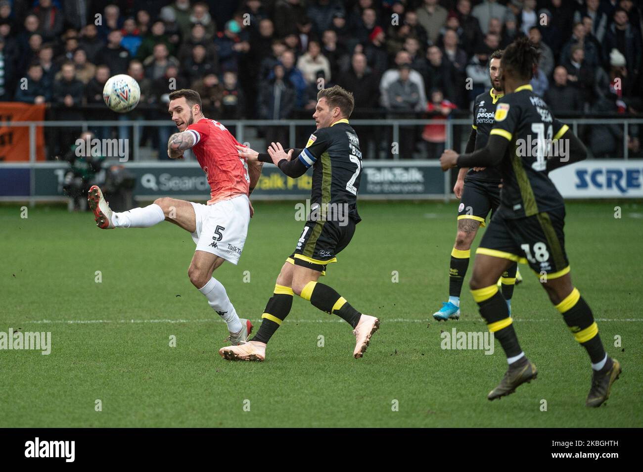 Liam Hogan of Salford City FC clears the ball from Dannie Bulman of Crawley Town FC during the Sky Bet League 2 match between Salford City and Crawley Town at Moor Lane, Salford on Saturday 8th February 2020. (Photo by Ian Charles/MI News/NurPhoto) Stock Photo