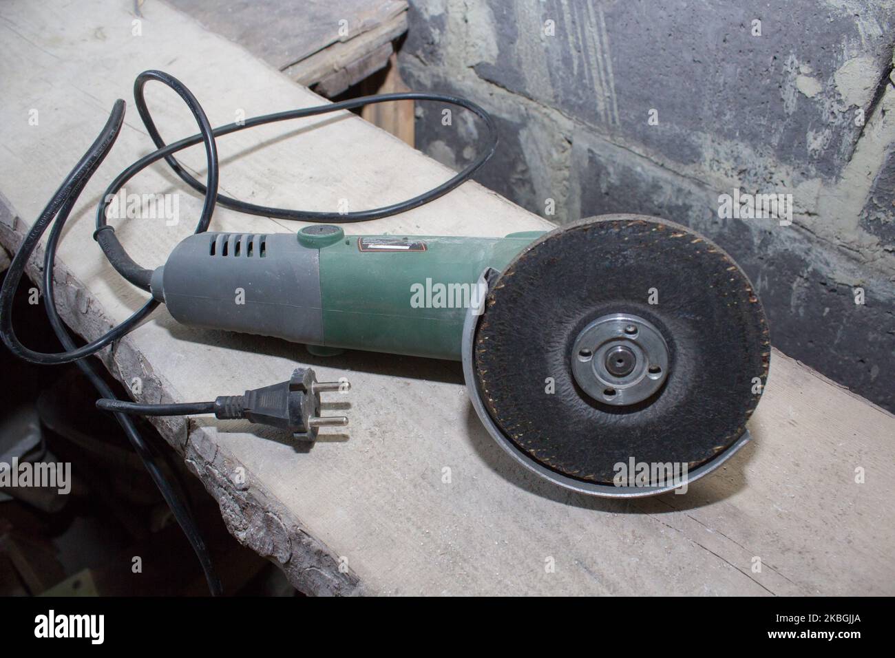 Angle Grinder tool for building the premises lying Stock Photo