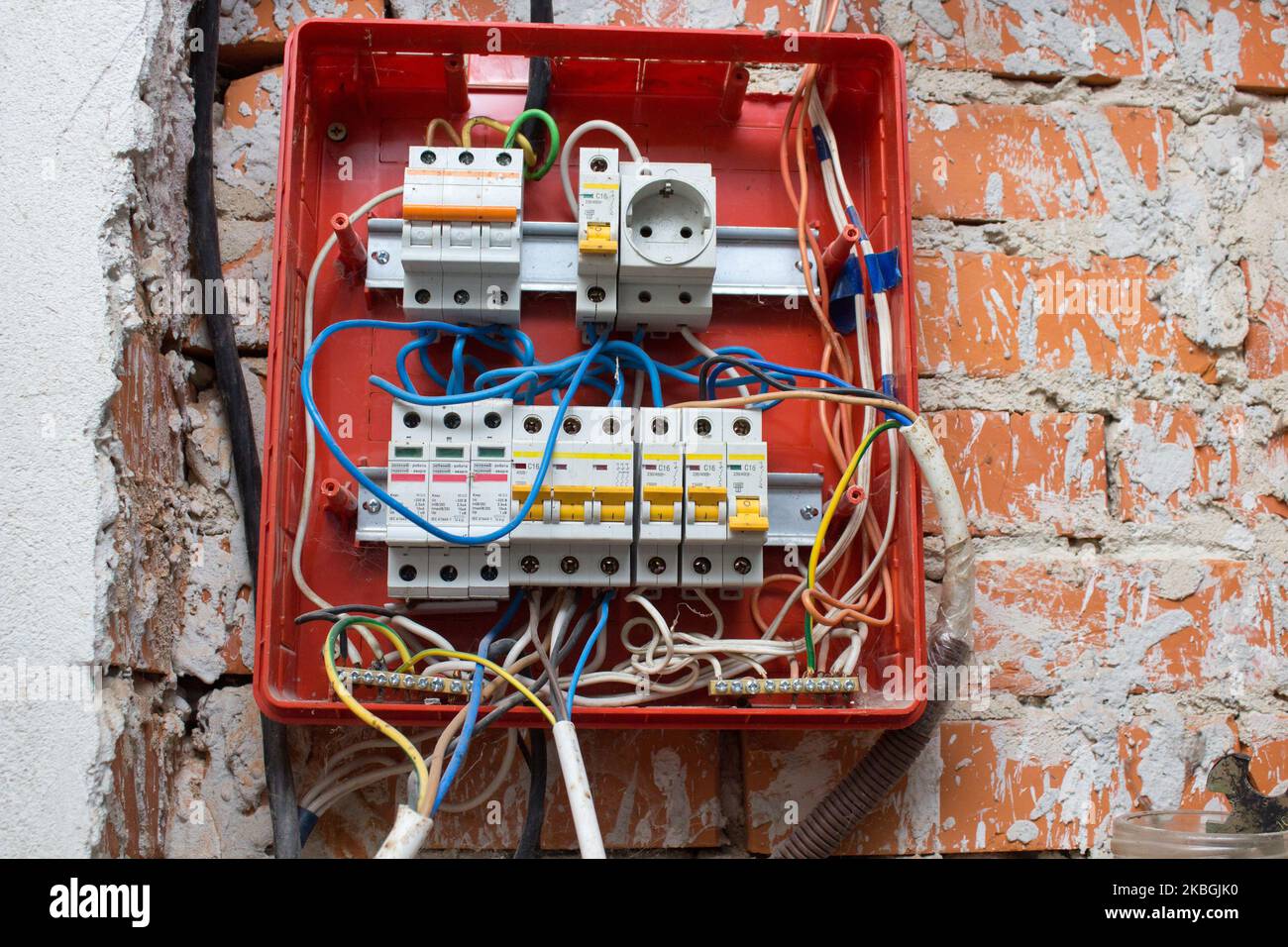 Electric distribution panels at home on a brick wall Stock Photo