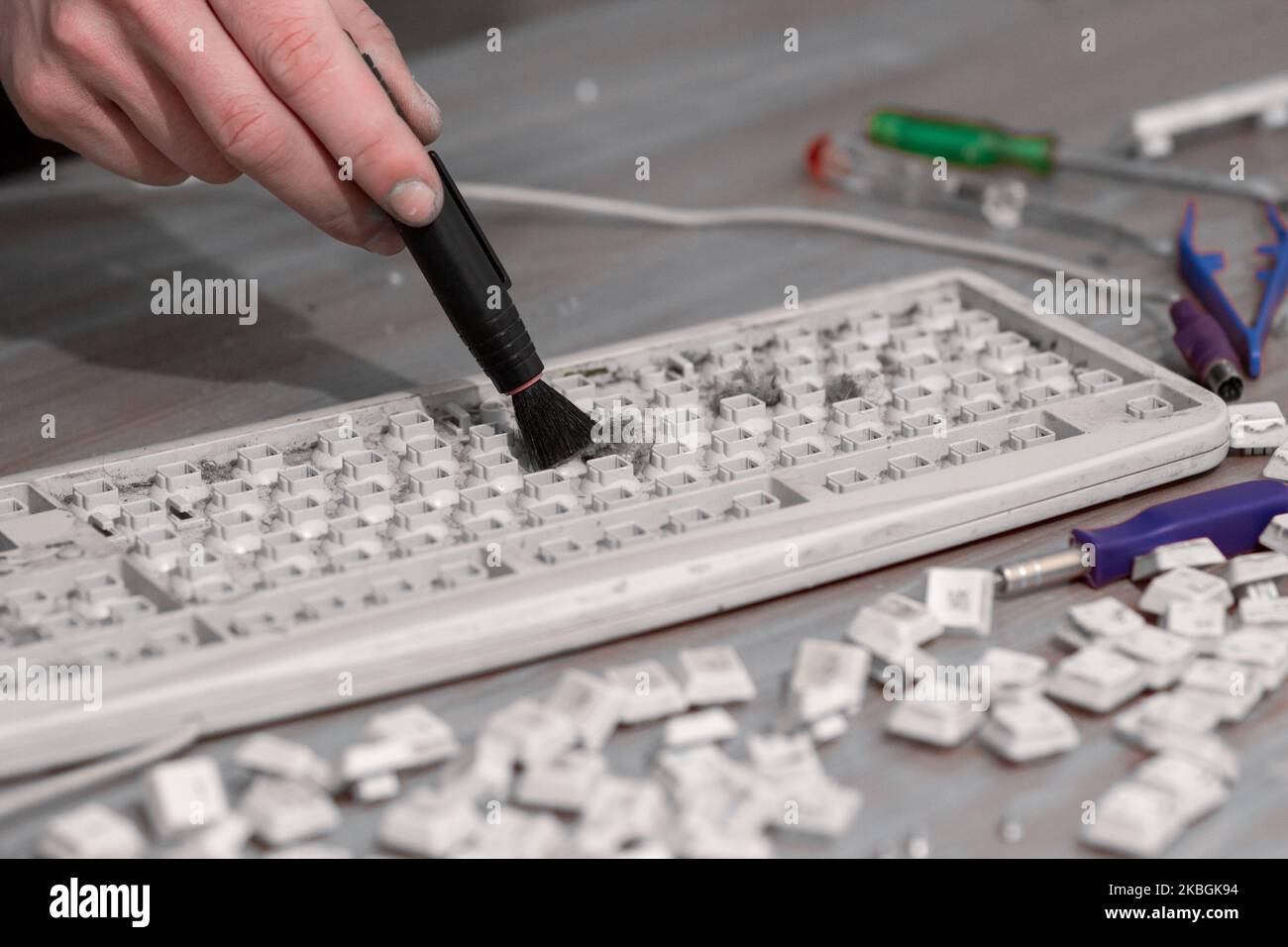 brush to clean dust from old keyboard Stock Photo Alamy