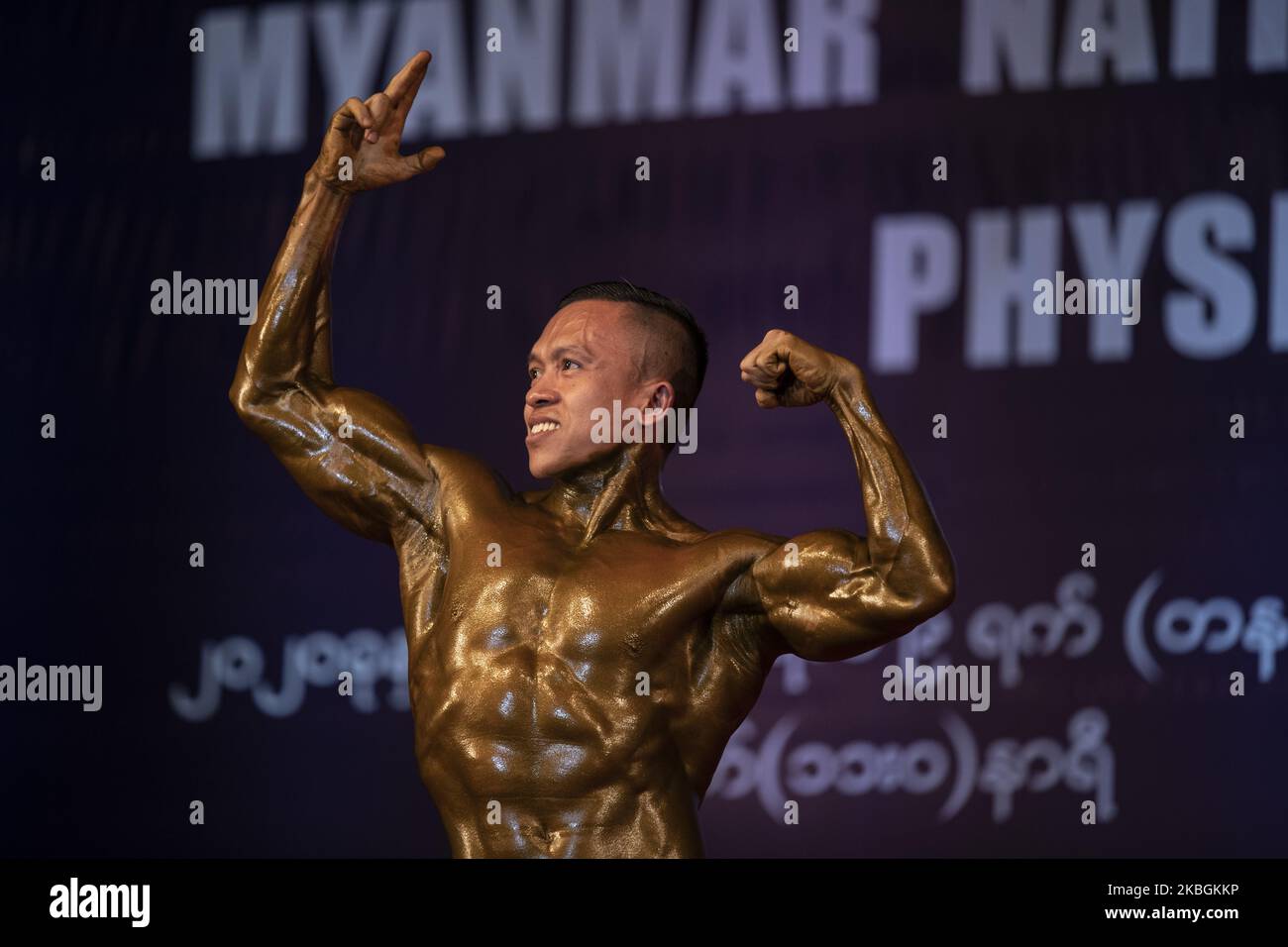 Male bodybuilding athlete competes in the Myanmar National Championship Bodybuilding and Physique Sports Competition in Yangon on February 9, 2020. (Photo by Shwe Paw Mya Tin/NurPhoto) Stock Photo