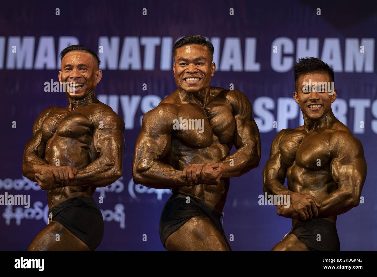 Male bodybuilding athletes compete in the Myanmar National Championship Bodybuilding and Physique Sports Competition in Yangon on February 9, 2020. (Photo by Shwe Paw Mya Tin/NurPhoto) Stock Photo