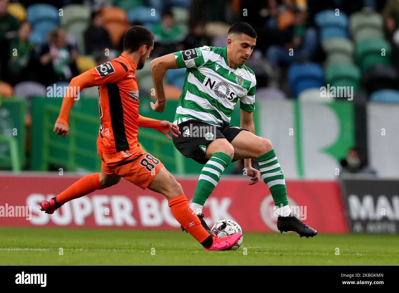 Rodrigo Battaglia of Sporting CP (R ) vies with Bruno Costa of Portimonense SC during the Portuguese League football match between Sporting CP and Portimonense SC at Jose Alvalade stadium in Lisbon, Portugal on February 9, 2020. (Photo by Pedro FiÃºza/NurPhoto) Stock Photo