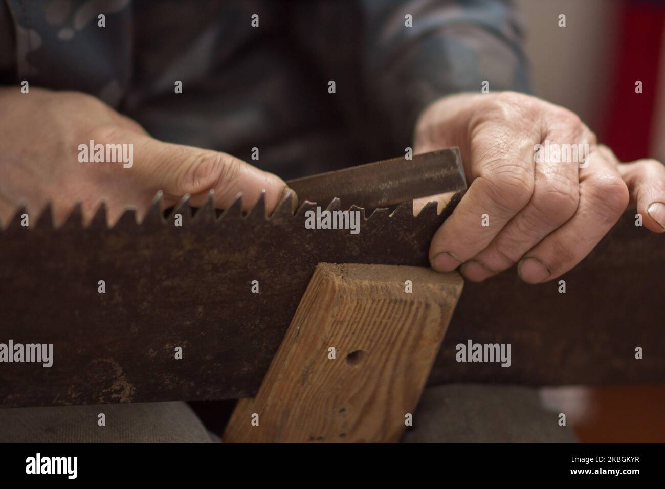 Hand grinding of saws hires stock photography and images Alamy
