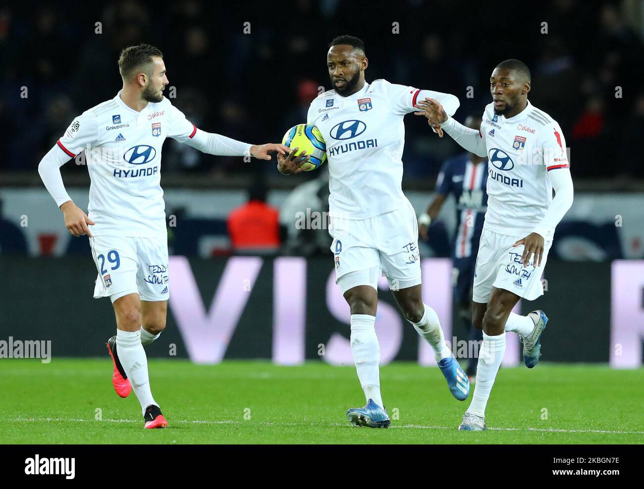 Moussa Dembele of OL celebrates with Karl Toko Ekambi and Lucas Tousart after scoring the goal of 2-3 during the football Ligue 1 Conforama match Paris Saint-Germain v Olympique Lyonnais at the Parc des Princes in Paris, France on February 9, 2020 (Photo by Matteo Ciambelli/NurPhoto) Stock Photo