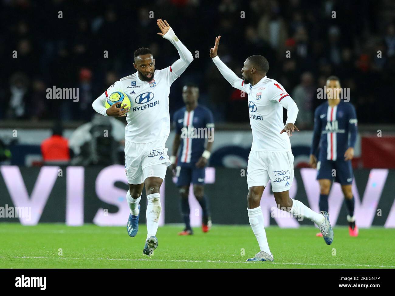 Moussa Dembele of OL celebrates with Karl Toko Ekambi after scoring the goal of 2-3 during the football Ligue 1 Conforama match Paris Saint-Germain v Olympique Lyonnais at the Parc des Princes in Paris, France on February 9, 2020 (Photo by Matteo Ciambelli/NurPhoto) Stock Photo