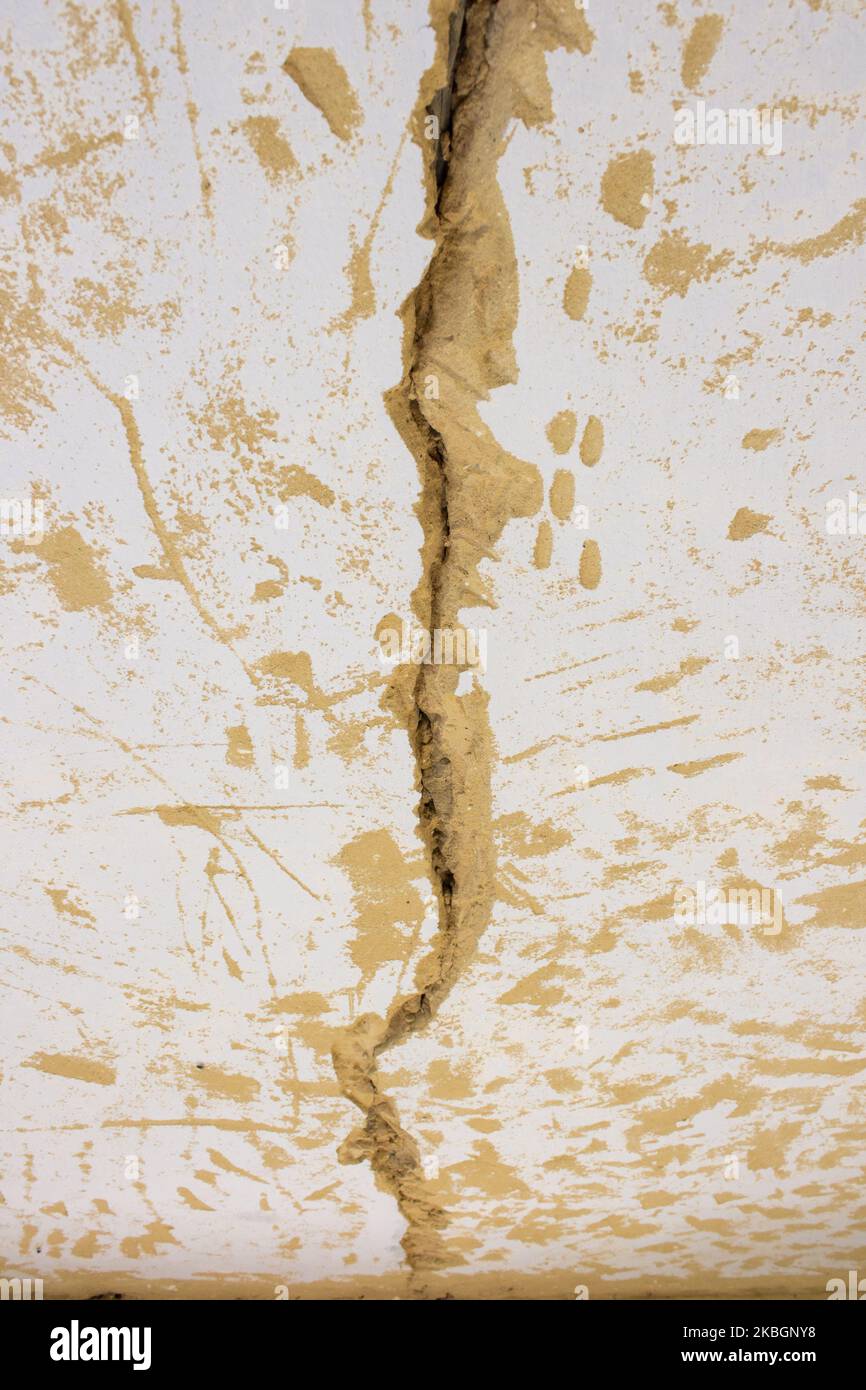 large crack in the ceiling after the earthquake Stock Photo