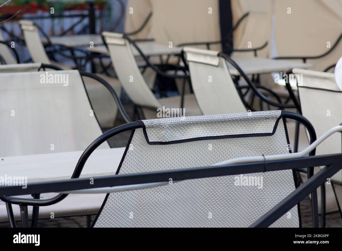 Empty chairs in a sidewalk cafe hi-res stock photography and images - Alamy