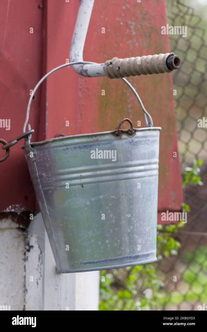 Vintage bucket water hi-res stock photography and images - Alamy