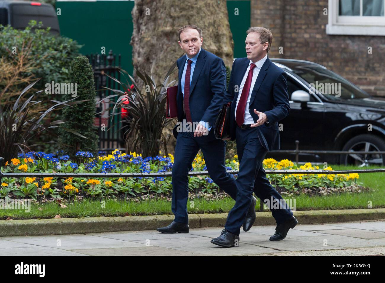 Secretary of State for Environment, Food and Rural Affairs George Eustice (L) and Secretary of State for Transport Grant Shapps (R) arrive in Downing Street in central London to attend a first cabinet meeting after reshuffle on 14 February, 2020 in London, England. Yesterday, Prime Minister Boris Johnson conducted a reshuffle of his government following Britain's departure from the EU. (Photo by WIktor Szymanowicz/NurPhoto) Stock Photo