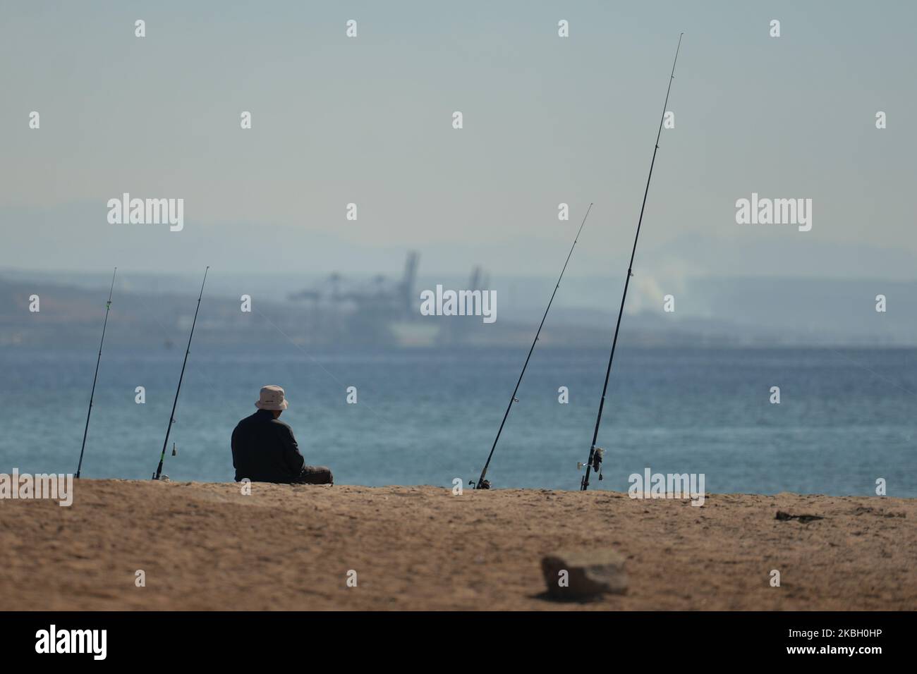 A local fisherman seen on Eilat beach. On Monday, February 3, 2020, in Eilat, Israel. (Photo by Artur Widak/NurPhoto) Stock Photo