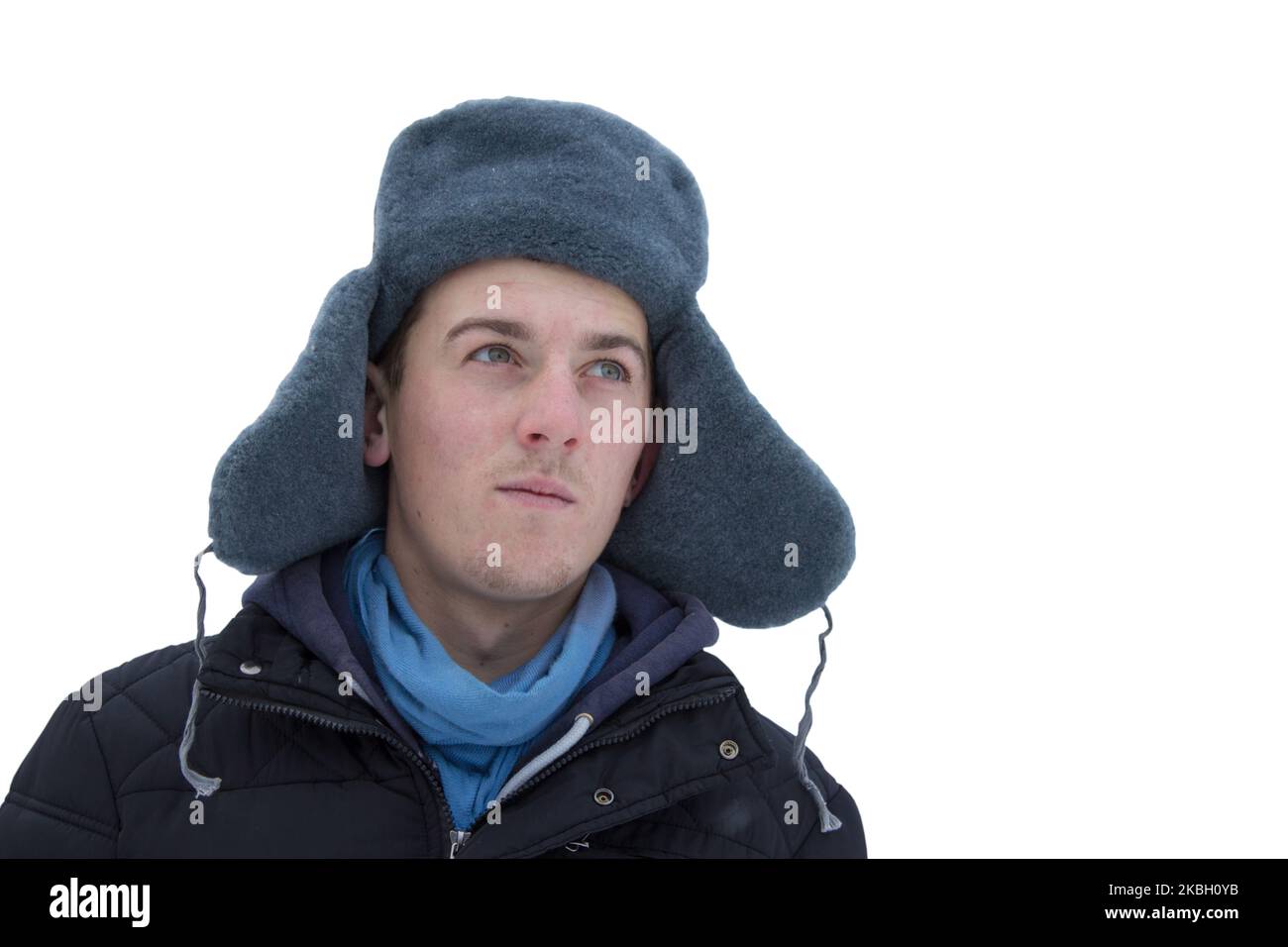 Isolated man in a winter hat with ears on a white background Stock Photo