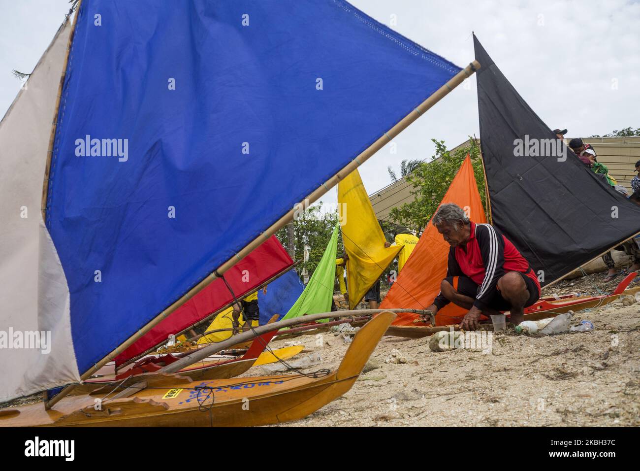 Participants at the Jong race (mini traditional sailboat) are preparing