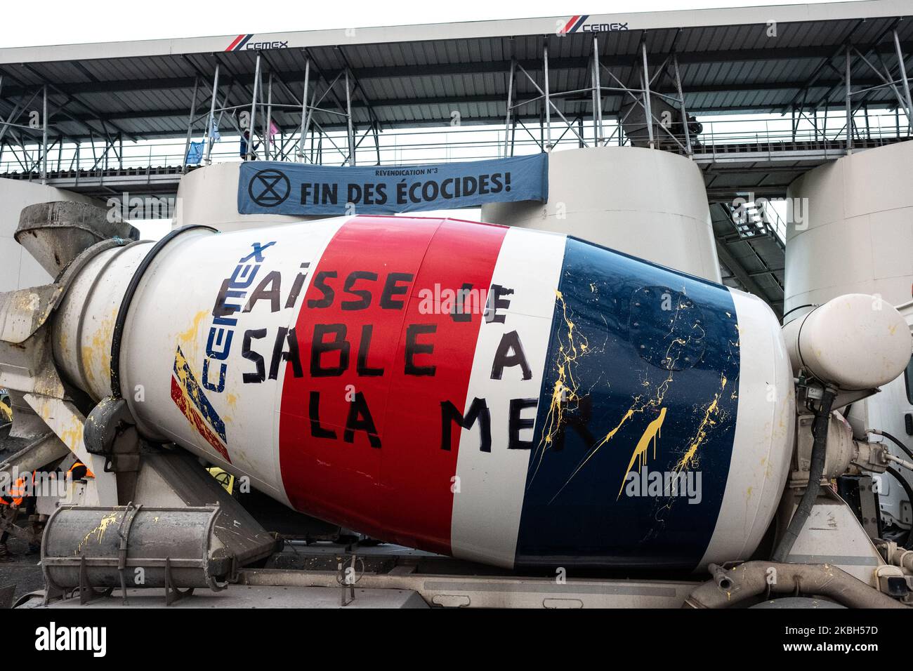 Hundreds of activists of Extinction Rebellion blocked the Lafarge Cemex site in Issy-Les-Moulineaux in Paris, France, on February 17, 2020 and stopping any work in this cement factory. It is a major cement production site. They denounce concrete production, GHG emissions from cement production and the depletion of natural resources. (Photo by Jerome Gilles/NurPhoto) Stock Photo