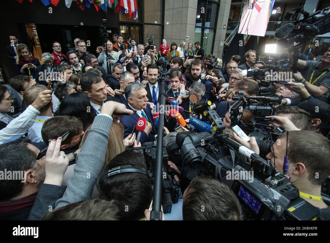 Prime Minister of Hungary Viktor Orban leaves and talks to the media, a doorstep press briefing at the atrium of Justus Lipsius building following a meeting during the second day of a special European Council EUCO, EURO summit, EU leaders in Brussels, Belgium about the future panning of the next long term budget of the European Union EU. February 21, 2020 (Photo by Nicolas Economou/NurPhoto) Stock Photo