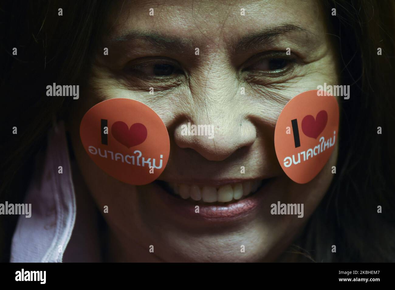 Supporters of Future Forward Party at the party headquarters in Bangkok ...