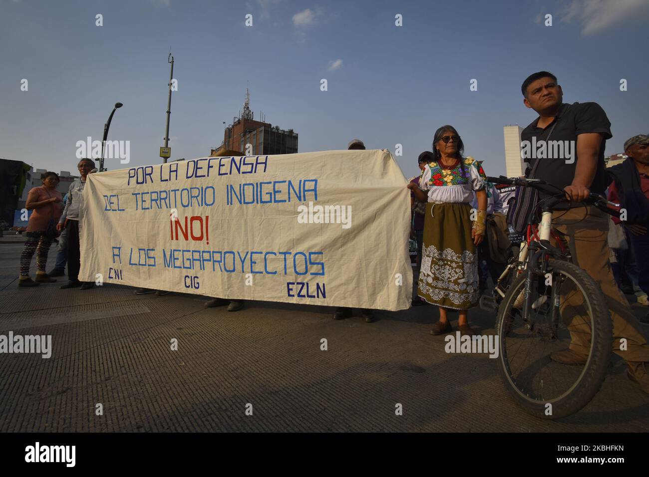 Some demonstrators hold a blanket during a protest in Mexico City, on
