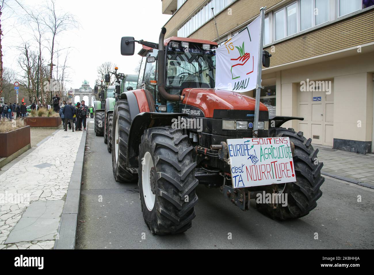 Farmers and European milk producers gather during a rally with the support of 150 tractors, they protest in front of the EU Headquarters around Schumanplein ahead and during of a special European Council summit, meeting of EU leaders on February 20, 2020 in Brussels, Belgium. The demonstration of the farmers in the capital of Belgium, Brussels is supported by the Wallon agricultural federation FWA, the Federation des Jeunes Agriculteurs and also the Flemish delegations of the Boerenbond, the General Farmer's Syndicate ABS and the young farmers of the Groene Kring. Farmers don't agree on the ne Stock Photo