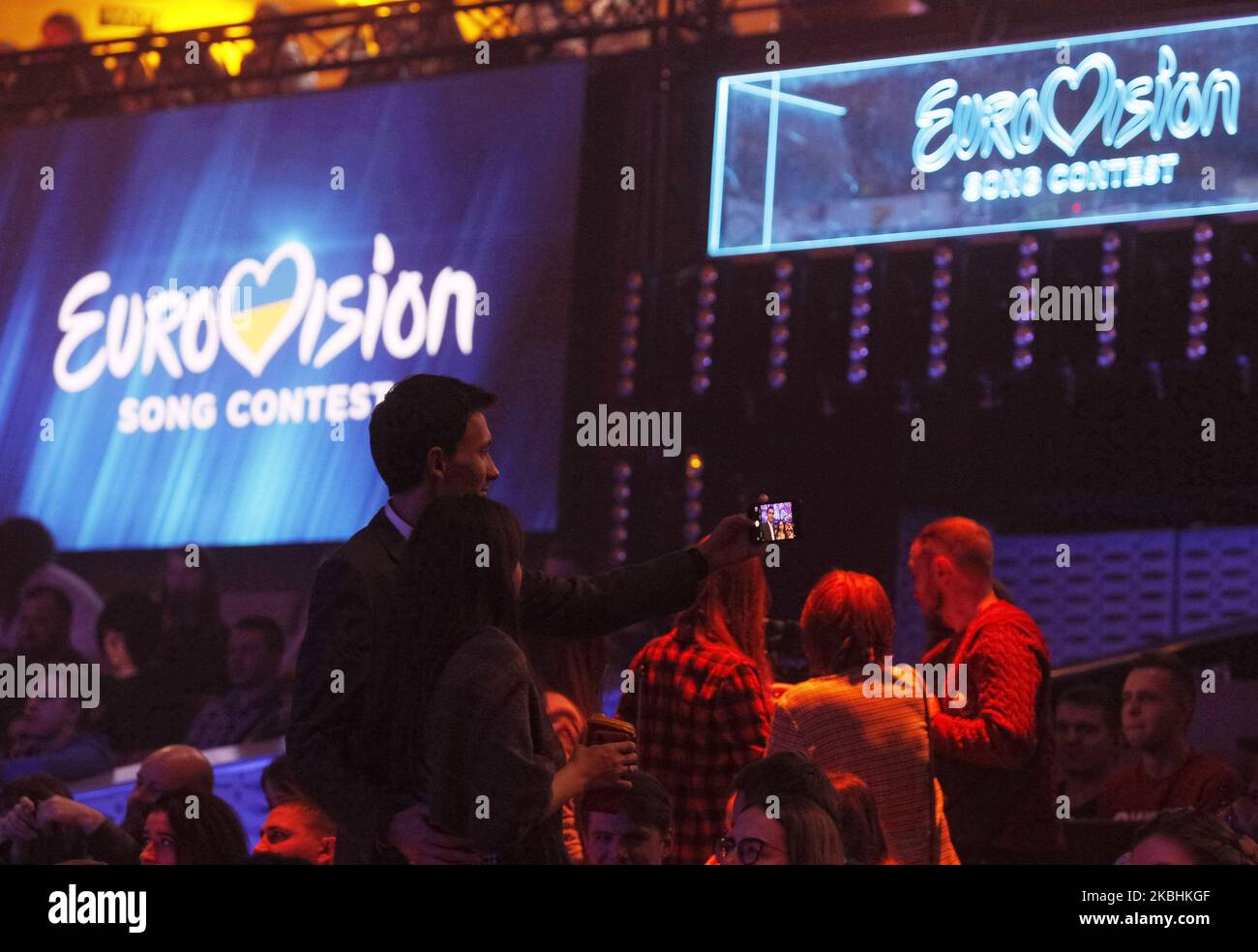 Visitors take selfie during the 2020 Eurovision Song Contest (ESC) national selection show, broadcasted by STB and UA:Pershyi TV channels, in Kyiv, Ukraine, on 22 February, 2020. Ukrainian band Go A with song Solovey will represent Ukraine at the Eurovision Song Contest (ESC) that consists of two semi-finals, to be held on 12 and 14 May, and a grand final taking place at the Rotterdam Ahoy in Rotterdam, Netherlands, on 16 May 2020. (Photo by STR/NurPhoto) Stock Photo
