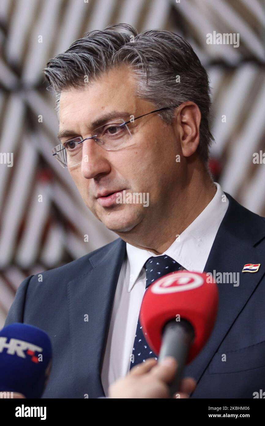 Prime Minister of Croatia Andrej Plenkovic as seen arriving on the red carpet with EU flags at forum Europa building. The Croatian PM is having a doorstep press and media briefing during the second day of the special European Council, EURO leaders summit - meeting about for the negotiations of the future planning of the next long term budget, financial framework of the European Union for 2021-2027. Brussels, Belgium, February 21, 2020 (Photo by Nicolas Economou/NurPhoto) Stock Photo