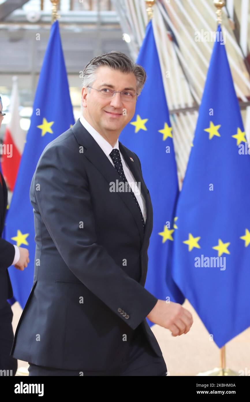 Prime Minister of Croatia Andrej Plenkovic as seen arriving on the red carpet with EU flags at forum Europa building. The Croatian PM is having a doorstep press and media briefing during the second day of the special European Council, EURO leaders summit - meeting about for the negotiations of the future planning of the next long term budget, financial framework of the European Union for 2021-2027. Brussels, Belgium, February 21, 2020 (Photo by Nicolas Economou/NurPhoto) Stock Photo