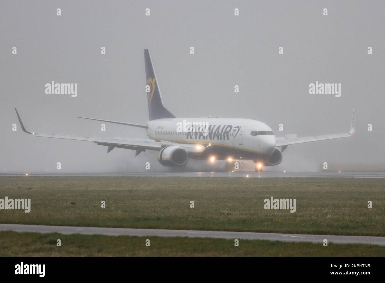 A Ryanair Boeing 737-800 or 737NG aircraft as seen landing at Polderbaan runway and taxiing during bad weather with a storm with rain, high wind velocity and haze at Amsterdam Schiphol AMS EHAM International Airport in the Netherlands on February 24, 2020. The airplane has the registration EI-DPP. Ryanair RYR FR is an Irish low cost - budget airline carrier one of the largest in Europe. (Photo by Nicolas Economou/NurPhoto) Stock Photo