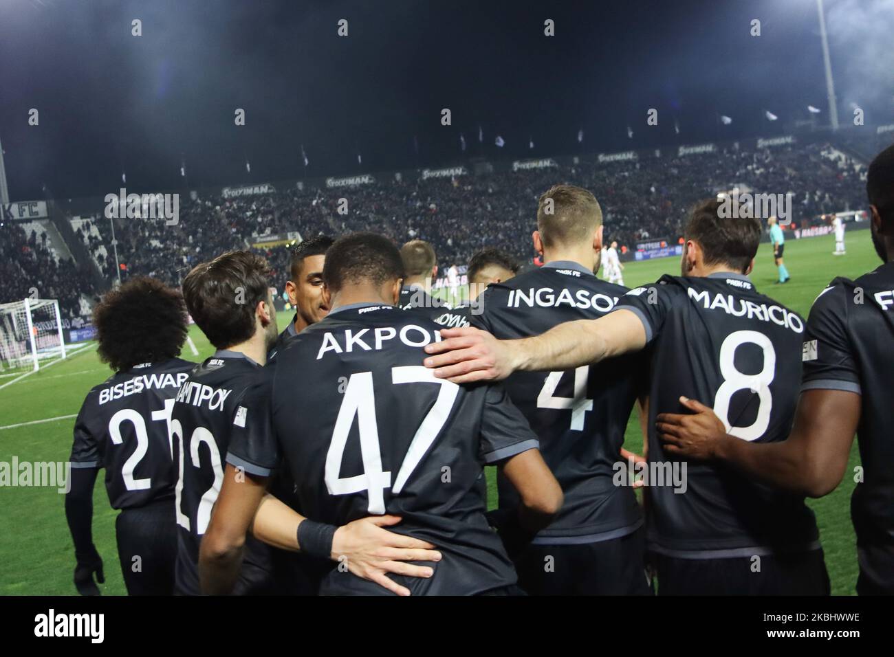 Chuba Amechi Akpom #47 striker of PAOK FC celebrating his first goal with his teammates during PAOK Thessaloniki v OFI Crete FC with final score 4-0 for Super League 1 Greece at Toumba Stadium home of PAOK in Thessaloniki. Akpom scored the first and second (penalty) of PAOK. Chuba Akpom is an English professional footballer striker player with previous career in Arsenal and as a loan to Brentford, Coventry City, Nottingham Forest, Hull City, Brighton, Hove Albion and Sint-Truiden. He had also participations in the young national teams of England U16, U17, U18, U19, U20, U21. February 9, 2020 ( Stock Photo