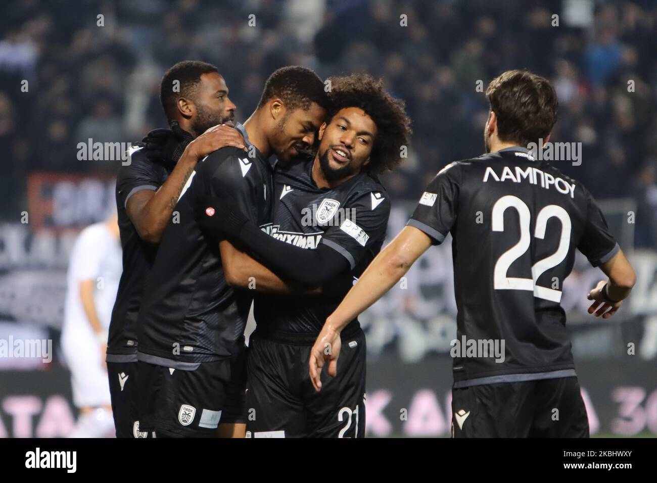 Chuba Amechi Akpom #47 striker of PAOK FC celebrating with his teammates his second goal during PAOK Thessaloniki v OFI Crete FC with final score 4-0 for Super League 1 Greece at Toumba Stadium home of PAOK in Thessaloniki. Akpom scored the first and second (penalty) of PAOK. Chuba Akpom is an English professional footballer striker player with previous career in Arsenal and as a loan to Brentford, Coventry City, Nottingham Forest, Hull City, Brighton, Hove Albion and Sint-Truiden. He had also participations in the young national teams of England U16, U17, U18, U19, U20, U21. February 9, 2020  Stock Photo