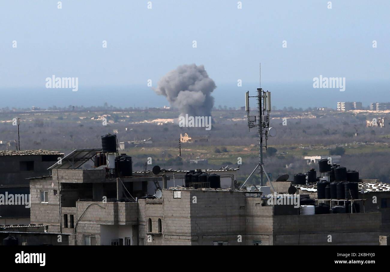 A picture taken on February 26, 2020 from Rafah in the southern Gaza Strip shows smoke billowing following an explosion close to the border on the Egyptian side of the divided city. (Photo by Abed Rahim Khatib/NurPhoto) Stock Photo