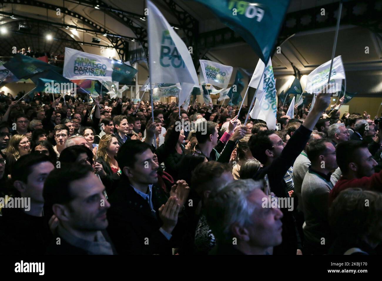 Paris Mayor and candidate for re-election Anne Hidalgo supporters wave flags during a campaign meeting at the Elysee Montmartre venue in Paris, on February 26, 2020, ahead of March 2020 mayoral elections in France. (Photo by Michel Stoupak/NurPhoto) Stock Photo