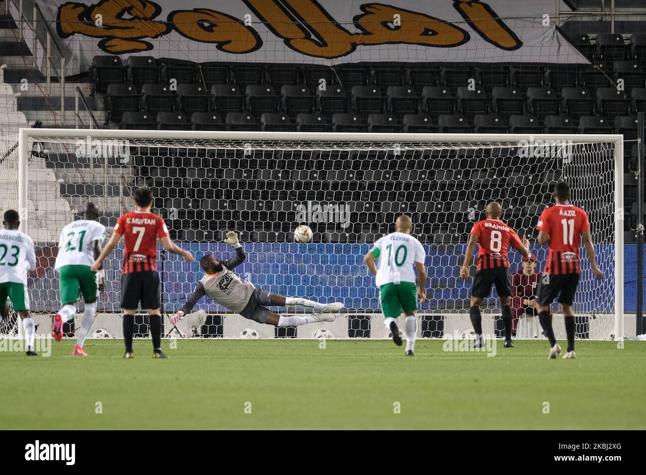 Yacine Brahimi converts a penalty and the only goal of the game during Al Rayyan v Al Ahlin 27 February 2020 at the Jassim Bin Hamad stadium in Doha, Qatar. (Photo by Simon Holmes/NurPhoto) Stock Photo