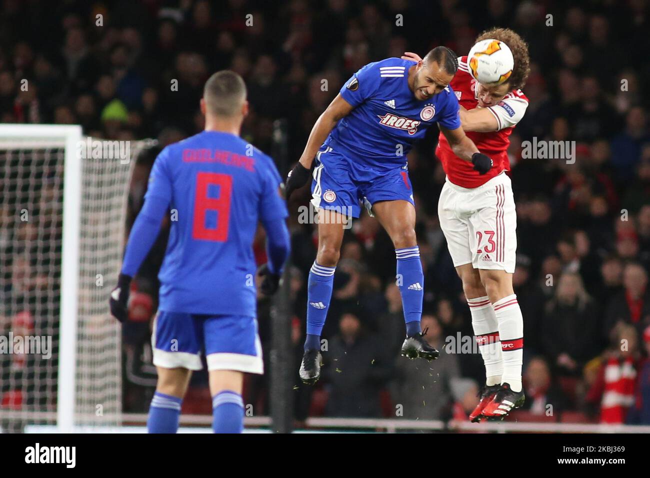 David Luiz (Arsenal) battle for the ball during the 2019/20 UEFA Europa  League 1/32 playoff finale game between Arsenal FC (England) and Olympiakos  FC (Greece) at Emirates Stadium, in London, United Kingdom,