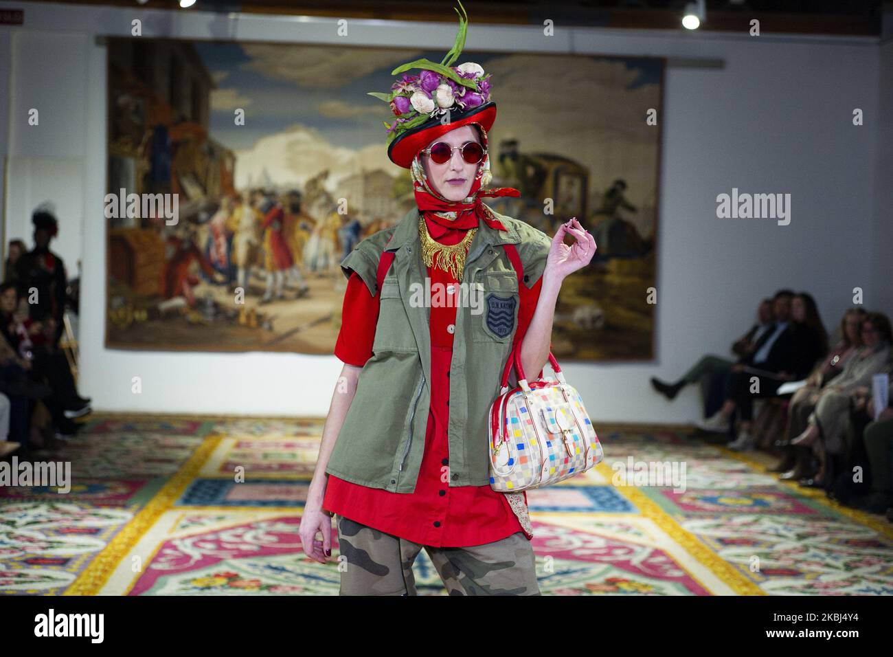 A model displays one of the creations the Manuel Fernandez in Fashion Art Institute designed by women of Northwest Africa using recycled materials at the Royal Fabric of Tapestry in Madrid, Spain, 28 February 2020. (Photo by Oscar Gonzalez/NurPhoto) Stock Photo