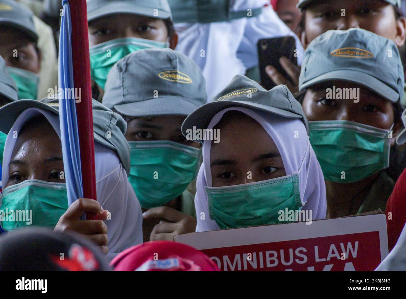 A number of workers who are members of the Trade Union rallied in the Batam city government area, Monday March 2, 2020. They reject the ratification of the Employment Copyright Omnibus Bill because workers claim not to be involved in the deliberation of the bill and its contents are considered to further reduce workers' welfare by eliminating the obligation to pay severance, abolishing the role of trade unions, the easy lay-off of workers and the imposition of wages based only on working hours (Photo by Teguh Prihatna/NurPhoto) Stock Photo