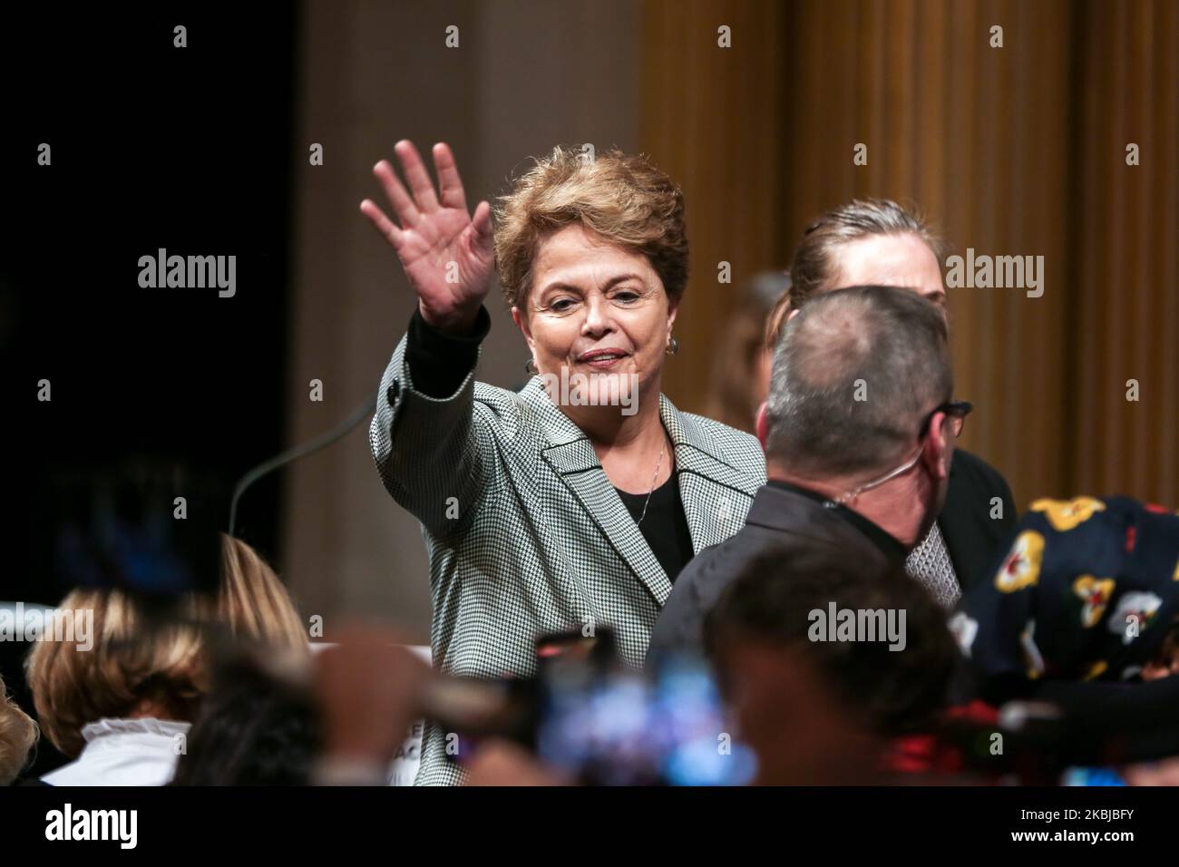 Former Brazilian president Dilma Rousseff (C) salute the crowd as she takes part in a ceremony at the City Hall of Paris, on March 2, 2020, during witch former Brazilian president Luiz Inacio Lula da Silva was named honorary citizen of the city of Paris. (Photo by Michel Stoupak/NurPhoto) Stock Photo