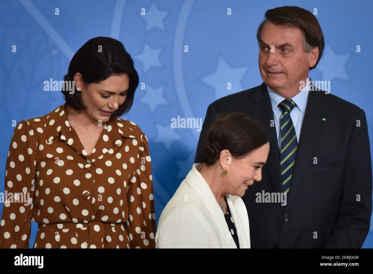 Alongside President Jair Bolsonaro and First Lady Michelle Bolsonaro, famous Brazilian novel actress, Regina Duarte, during her inauguration ceremony as Brazil’s Culture Secretary, at the Planalto Palace in Brasília, Brazil on March 4, 2020. Duarte takes over from Roberto Alvim, who was fired in January after publishing a video with references to Nazi cultural propaganda. (Photo by Andre Borges/NurPhoto) Stock Photo