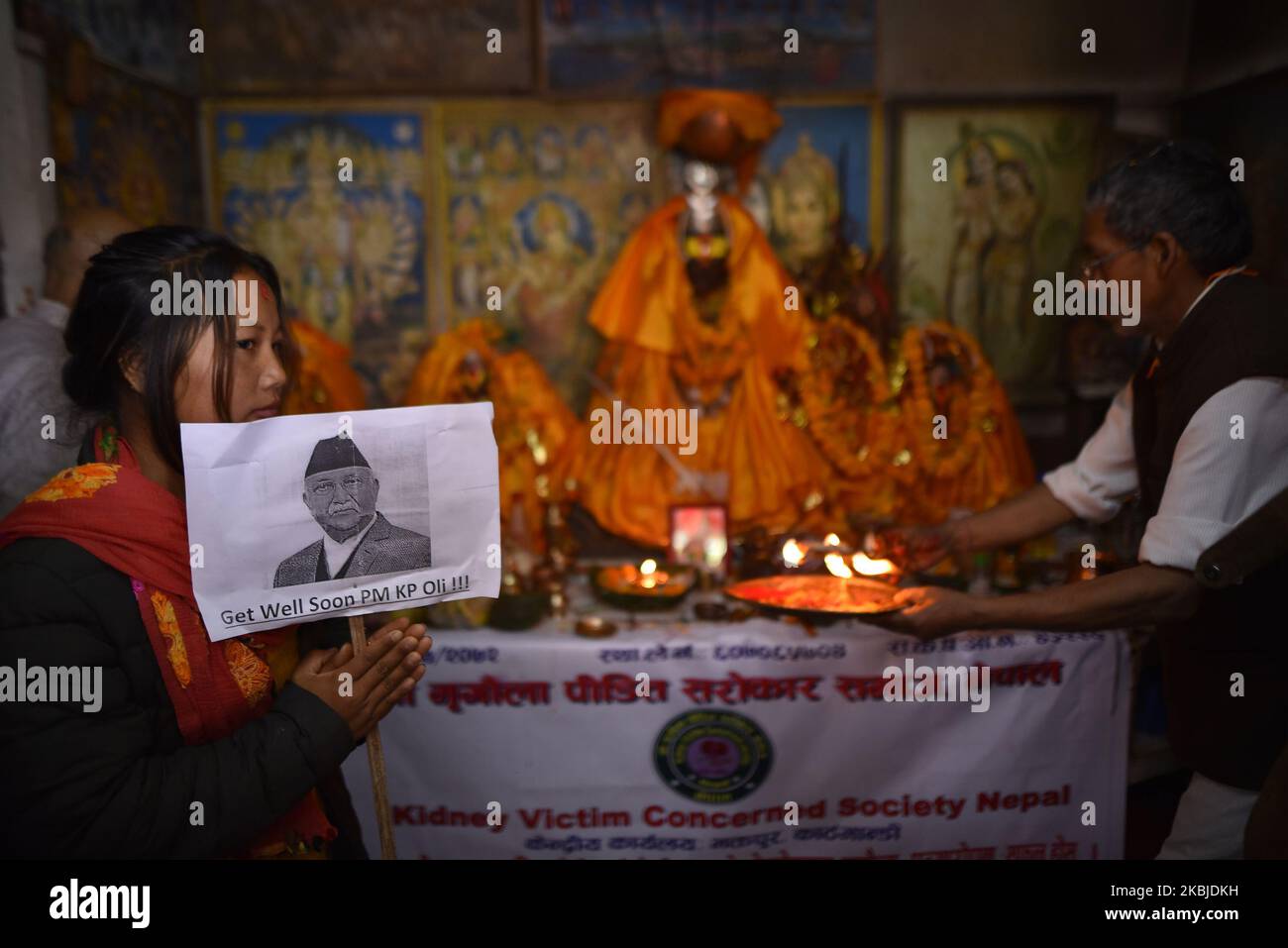 Members of Kidney Victim Concerned Society Nepal offering rituals in the hospital premises temple during second time Kidney transplant of Prime Minister KP Sharma Oli at Tribhuwan University Teaching Hospital (TUTH)'s Manmohan Cardiothoracic Vascular and Transplant on Wednesday, 04 March 2020. (Photo by Narayan Maharjan/NurPhoto) Stock Photo