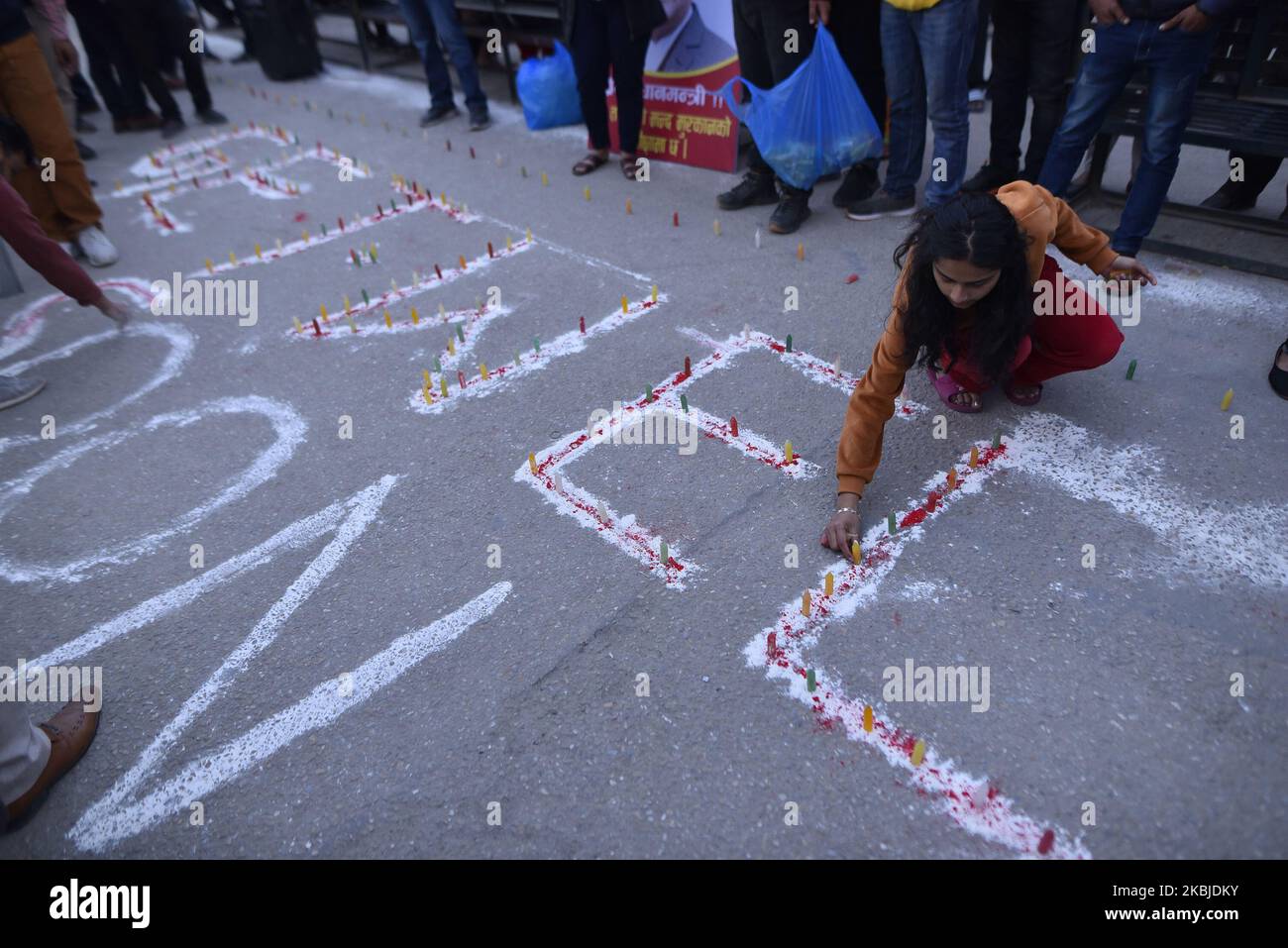 A Nepalese people, supporters arrange for the candle light with the slogan GET WELL SOON Rt. HON. PM at the hospital premises after successful second time Kidney transplant of Prime Minister KP Sharma Oli at Tribhuwan University Teaching Hospital (TUTH)'s Manmohan Cardiothoracic Vascular and Transplant on Wednesday, 04 March 2020. (Photo by Narayan Maharjan/NurPhoto) Stock Photo