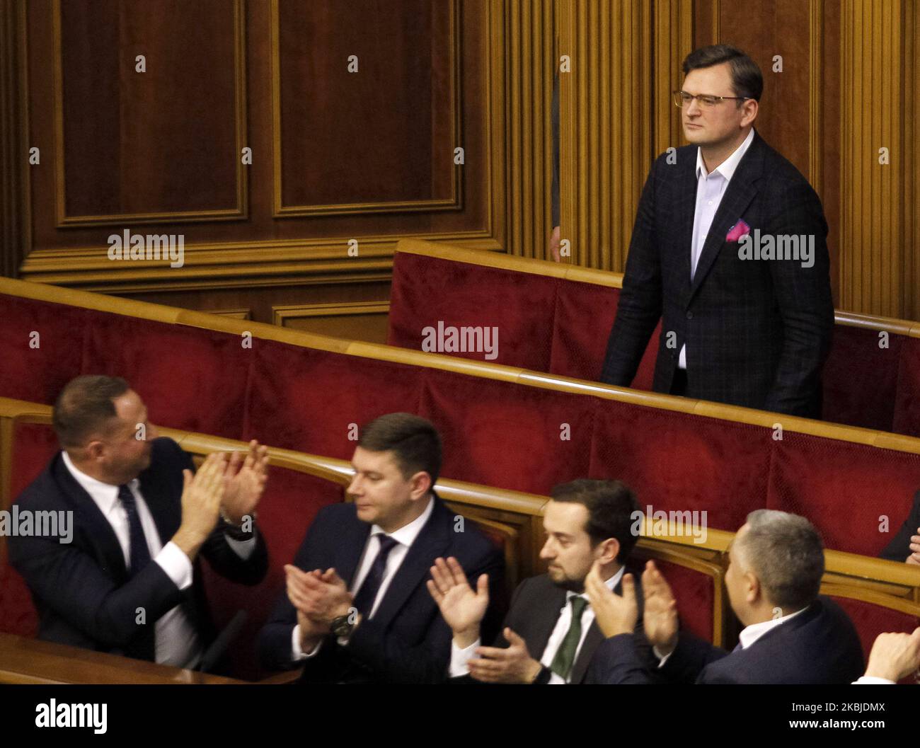 Newly appointed Ukrainian Foreign Minister Dmytro Kuleba (R) reacts during a session of Ukrainian Parliament, in Kyiv, Ukraine, on 04 March, 2020. Ukrainian Parliament voited for appointment of new Ukraine's Prime minister and newly the Cabinet of Ministers. (Photo by STR/NurPhoto) Stock Photo