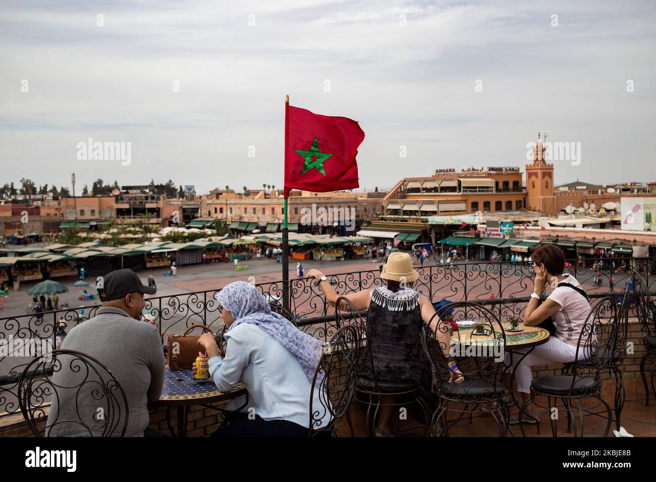 Marrakech, France, 19 October 2019. Tourists and locals enjoy the view of Jemaa el-Fna square from the cafe de glacier. (Photo by Emeric Fohlen/NurPhoto) Stock Photo